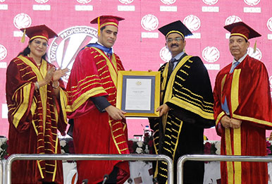 Dr. Mittal confers degree on VP Adhin